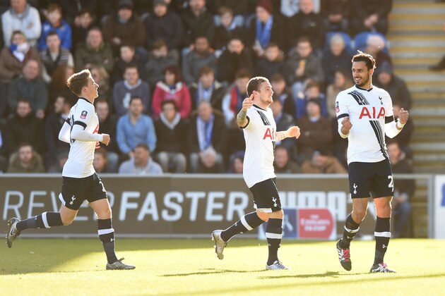 COLCHESTER, ENGLAND - JANUARY 30:  Nacer Chadli (R) of Tottenham Hotspur celebrates scoring his team's first goal with his team mates Kieran Trippier (C) and Tom Carroll (L) during the Emirates FA Cup Fourth Round match between Colchester United and Tottenham Hotspur at Weston Homes Community Stadium on January 30, 2016 in Colchester, England.  (Photo by Michael Regan/Getty Images)