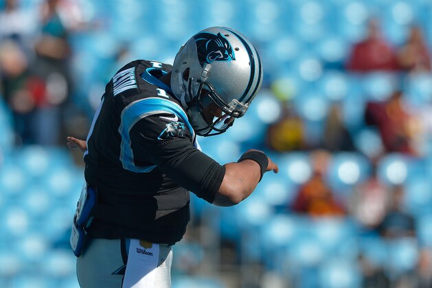 CHARLOTTE, NC - NOVEMBER 22:  Cam Newton #1 of the Carolina Panthers dances The Dab as he warms up during their game against the Washington Redskins at Bank of America Stadium on November 22, 2015 in Charlotte, North Carolina. The Panthers won 44-16.  (Photo by Grant Halverson/Getty Images)