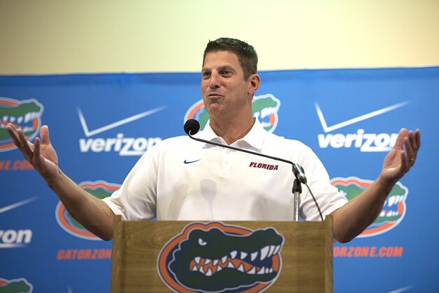 Doug Nussmeier, Florida's NCAA college football offensive coordinator/quarterbacks coach, talks to the media at the teams media day in Gainesville, Fla., Wednesday, Aug. 5, 2015. (AP Photo/Phil Sandlin)