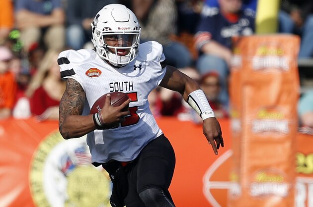 Jan 30, 2016; Mobile, AL, USA; South squad quarterback Dak Prescott of Mississippi State (15) scrambles for yardage during first half of the Senior Bowl at Ladd-Peebles Stadium. Mandatory Credit: Butch Dill-USA TODAY Sports
