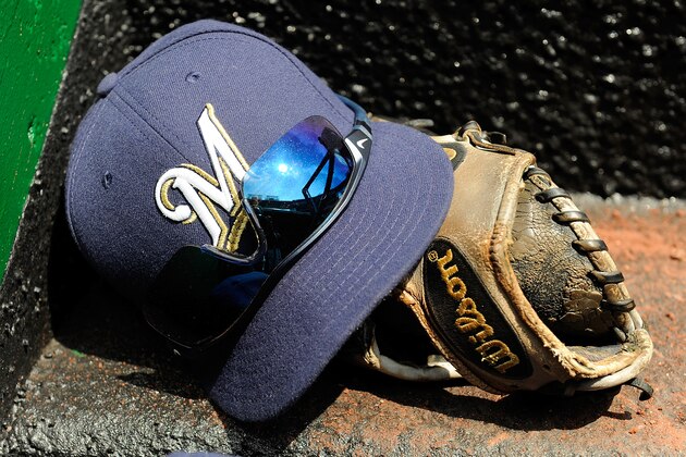 WASHINGTON, DC - AUGUST 23:  Milwaukee Brewers hat and glove on the dugout steps during the game against the Washington Nationals at Nationals Park on August 23, 2015 in Washington, DC.  (Photo by G Fiume/Getty Images)