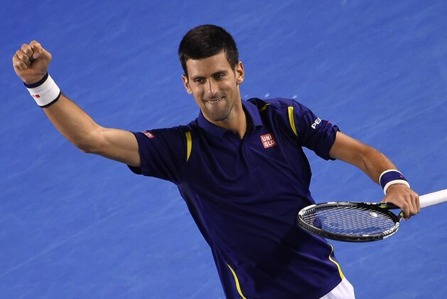 Serbia's Novak Djokovic celebrates after victory in his men's singles semi-final match against Switzerland's Roger Federer on day eleven of the 2016 Australian Open tennis tournament in Melbourne on January 28, 2016. AFP PHOTO / WILLIAM WEST-- IMAGE RESTRICTED TO EDITORIAL USE - STRICTLY NO COMMERCIAL USE / AFP / WILLIAM WEST        (Photo credit should read WILLIAM WEST/AFP/Getty Images)