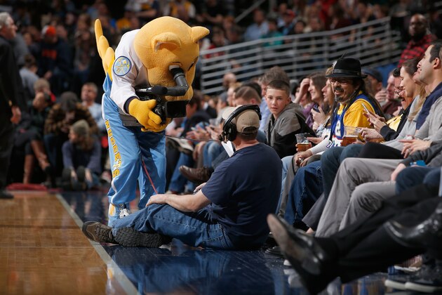 DENVER, CO - MARCH 03: Super mascot Rocky of the Denver Nuggets turns the camera on the cameraman as they face the Milwaukee Bucks at Pepsi Center on March 3, 2015 in Denver, Colorado. The Nuggets defeated the Bucks 106-95. NOTE TO USER: User expressly acknowledges and agrees that, by downloading and or using this photograph, User is consenting to the terms and conditions of the Getty Images License Agreement. (Photo by Doug Pensinger/Getty Images) DENVER, CO - MARCH 03: Super mascot Rocky of the Denver Nuggets turns the camera on the cameraman as they face the Milwaukee Bucks at Pepsi Center on March 3, 2015 in Denver, Colorado. The Nuggets defeated the Bucks 106-95. NOTE TO USER: User expressly acknowledges and agrees that, by downloading and or using this photograph, User is consenting to the terms and conditions of the Getty Images License Agreement. (Photo by Doug Pensinger/Getty Images)