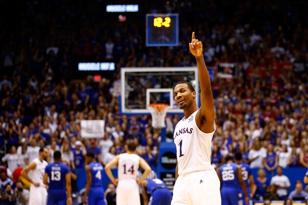 LAWRENCE, KS - JANUARY 30:  Wayne Selden Jr. #1 of the Kansas Jayhawks celebrates during the final seconds of overtime in the game against the Kentucky Wildcats as Kansas defeated Kentucky with a final score of 90-84 at Allen Fieldhouse on January 30, 2016 in Lawrence, Kansas.  (Photo by Jamie Squire/Getty Images)