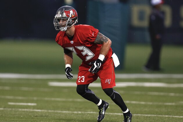 TAMPA, FL - AUGUST 1: Cornerback Chris Conte #23 of the Tampa Bay Buccaneers works out during the first day of Training Camp at the University of South Florida on August 1, 2015 in Tampa, Florida. (Photo by Don Juan Moore/Getty Images)