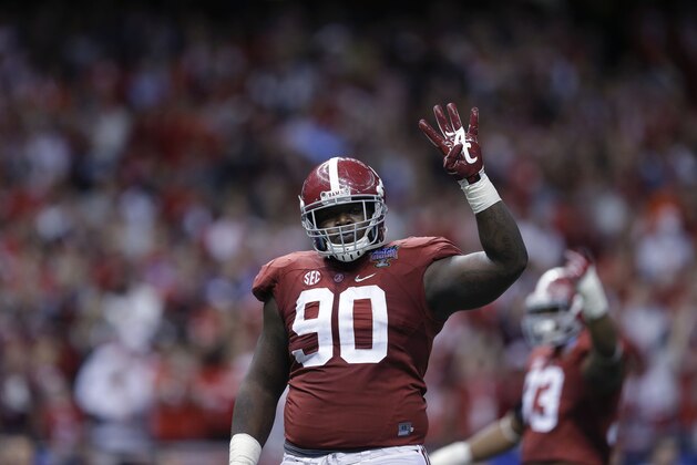 Alabama defensive lineman Jarran Reed (90) walks on the field in the second half of the Sugar Bowl NCAA college football playoff semifinal game against Ohio State, Thursday, Jan. 1, 2015, in New Orleans. (AP Photo/Brynn Anderson)