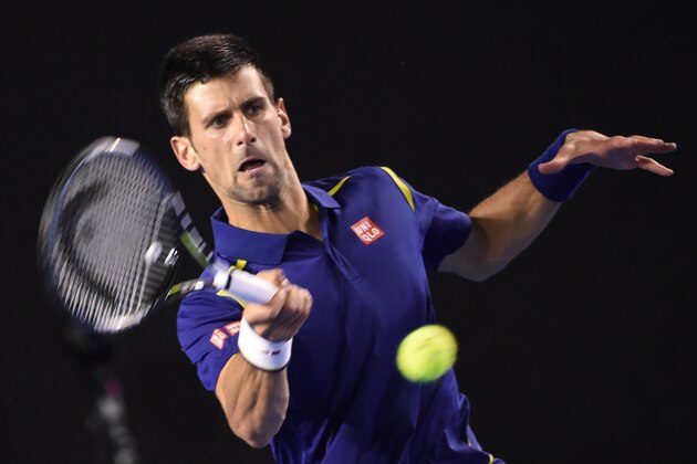 Serbia's Novak Djokovic plays a forehand return during his men's singles final match against Britain's Andy Murray on day fourteen of the 2016 Australian Open tennis tournament in Melbourne on January 31, 2016. AFP PHOTO / WILLIAM WEST-- IMAGE RESTRICTED TO EDITORIAL USE - STRICTLY NO COMMERCIAL USE / AFP / WILLIAM WEST        (Photo credit should read WILLIAM WEST/AFP/Getty Images)