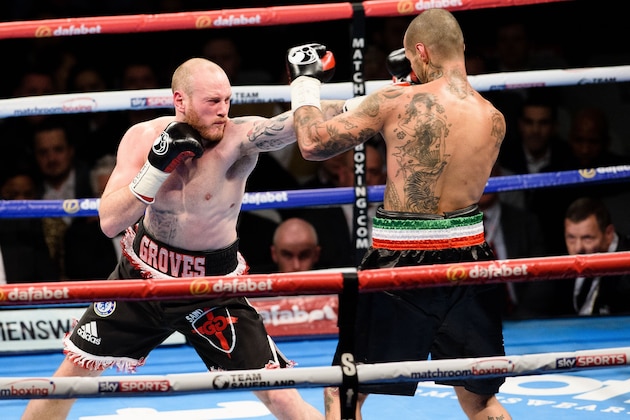 British boxer George Groves (L) vies against Italian boxer Andrea Di Luisa during their International Super-Middleweight contest in east London, England on January 30, 2016. 
Groves went on to win the match. / AFP / LEON NEAL        (Photo credit should read LEON NEAL/AFP/Getty Images)