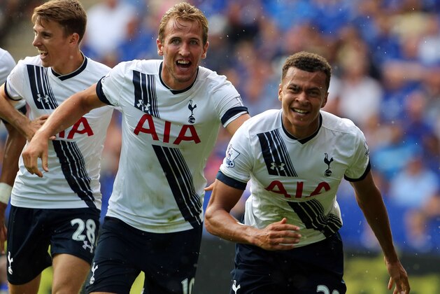 Tottenham Hotspur's midfielder Dele Alli (R) celebrates scoring a goal with team mate Engish striker Harry Kane (C) during the English Premier League football match between Leicester City and Tottenham Hotspur at King Power Stadium in Leicester, central England on August 22, 2015. AFP PHOTO / GEOFF CADDICK

RESTRICTED TO EDITORIAL USE. No use with unauthorized audio, video, data, fixture lists, club/league logos or 'live' services. Online in-match use limited to 75 images, no video emulation. No use in betting, games or single club/league/player publications.        (Photo credit should read GEOFF CADDICK/AFP/Getty Images)