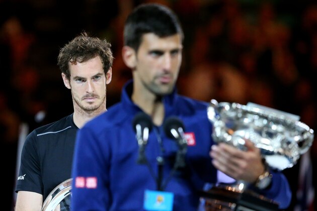 MELBOURNE, AUSTRALIA - JANUARY 31:  Australian Open champion Novak Djokovic of Serbia holds the Norman Brookes Challenge Cup as Andy Murray of Great Britain looks on after the Men's Singles Final  during day 14 of the 2016 Australian Open at Melbourne Park on January 31, 2016 in Melbourne, Australia.  (Photo by Scott Barbour/Getty Images)
