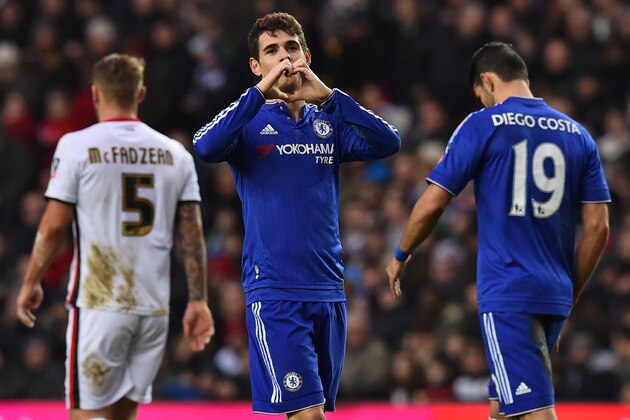 Chelsea's Brazilian midfielder Oscar (C) celebrates after scoring the opening goal of the English FA Cup fourth round football match between MK Dons and Chelsea at Stadium MK in Milton Keynes, central England, on January 31, 2016. / AFP / BEN STANSALL / RESTRICTED TO EDITORIAL USE. No use with unauthorized audio, video, data, fixture lists, club/league logos or 'live' services. Online in-match use limited to 75 images, no video emulation. No use in betting, games or single club/league/player publications.  /         (Photo credit should read BEN STANSALL/AFP/Getty Images)