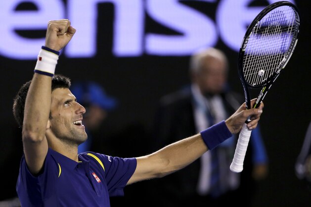 Novak Djokovic of Serbia celebrates after defeating Andy Murray of Britain in the men's singles final at the Australian Open tennis championships in Melbourne, Australia, Sunday, Jan. 31, 2016.(AP Photo/Rick Rycroft)