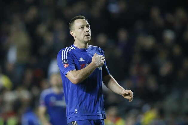 Chelsea's captain John Terry acknowledges the fans as he celebrates after the final whistle of the English FA Cup fourth round soccer match between Milton Keynes Dons and Chelsea at Stadium mk in Milton Keynes, England, Sunday, Jan. 31, 2016. Chelsea won 5-1. (AP Photo/Kirsty Wigglesworth)