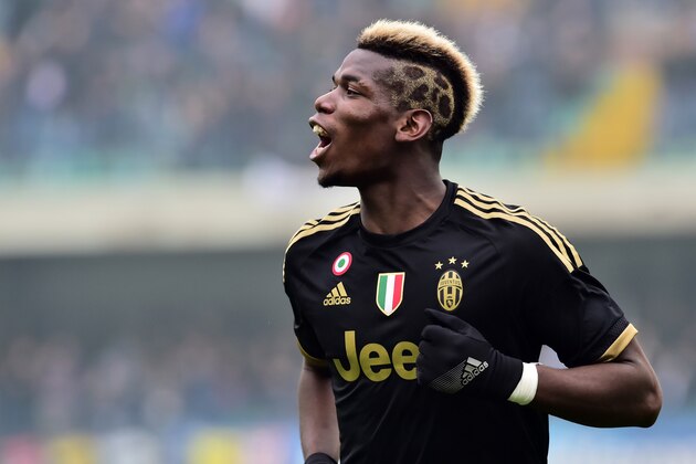 Juventus' midfielder from France Paul Pogba celebrates after scoring a goal during the Serie A football match between Chievo Verona and Juventus on January 31, 2016 at Bentegodi Stadium in Verona.  / AFP / GIUSEPPE CACACE        (Photo credit should read GIUSEPPE CACACE/AFP/Getty Images)