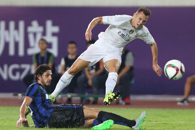 GUANGZHOU, CHINA - JULY 27: Denis Cheryshev of Real Madrid attempts a goal against Ranocchia Andrea of FC Internazionale during the match of International Champions Cup match between Real Madrid and FC Internazionale at Tianhe Stadium on July 27, 2015 in Guangzhou, China. (Photo by Zhong Zhi/Getty Images) GUANGZHOU, CHINA - JULY 27: Denis Cheryshev of Real Madrid attempts a goal against Ranocchia Andrea of FC Internazionale during the match of International Champions Cup match between Real Madrid and FC Internazionale at Tianhe Stadium on July 27, 2015 in Guangzhou, China. (Photo by Zhong Zhi/Getty Images)