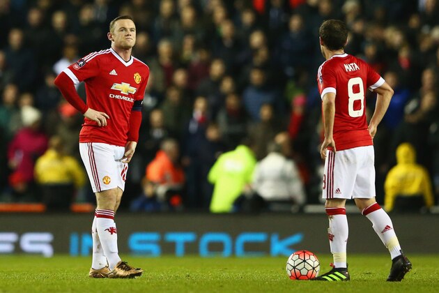DERBY, ENGLAND - JANUARY 29:  Wayne Rooney (L) and Juan Mata of Manchester United (8) look dejected as George Thorne of Derby County scores their first and equalising goal during the Emirates FA Cup fourth round match between Derby County and Manchester United at iPro Stadium on January 29, 2016 in Derby, England.  (Photo by Matthew Lewis/Getty Images)