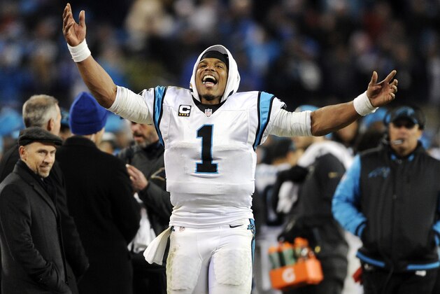 Carolina Panthers' Cam Newton celebrates after the NFL football NFC Championship game against the Arizona Cardinals, Sunday, Jan. 24, 2016, in Charlotte, N.C. The Panthers won 49-15 to advance to the Super Bowl. (AP Photo/Mike McCarn)