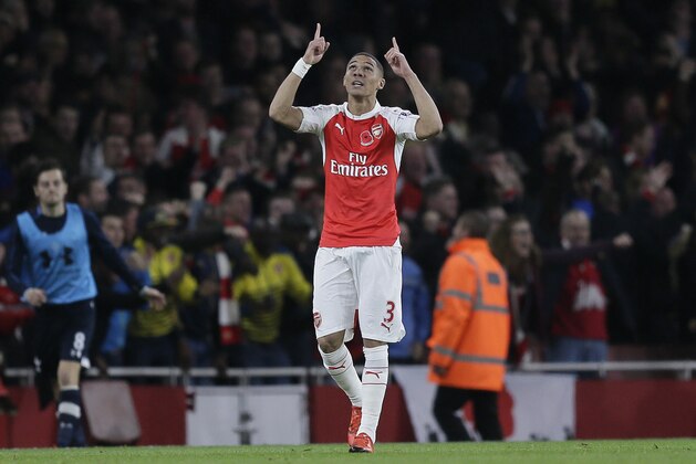 Arsenal’s Kieran Gibbs celebrates after scoring a goal during the English Premier League soccer match between Arsenal and Tottenham Hotspur at the Emirates Stadium in London, Sunday Nov. 8, 2015. (AP Photo/Tim Ireland)