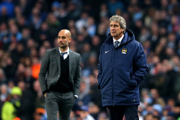 MANCHESTER, ENGLAND - NOVEMBER 25:  (R-L) Manuel Pellegrini the manager of Manchester City and Josep Guardiola the head coach of Bayern Muenchen look on during the UEFA Champions League Group E match between Manchester City and FC Bayern Muenchen at the Etihad Stadium on November 25, 2014 in Manchester, United Kingdom.  (Photo by Alex Livesey/Getty Images)