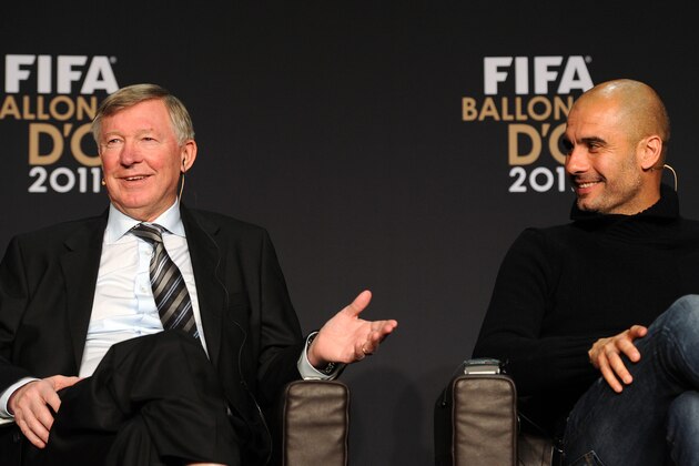 Nominees for the Fifa World coach of the Year for Men’s Football, Sir Alex Ferguson (L), manager of Manchester United speaks with Barcelona's Spanish coach Pep Guardiola during a press conference prior to the FIFA Ballon d'Or ceremony on January 9, 2012 at the Kongresshaus in Zurich. 
AFP PHOTO/FRANCK FIFE (Photo credit should read FRANCK FIFE/AFP/Getty Images)