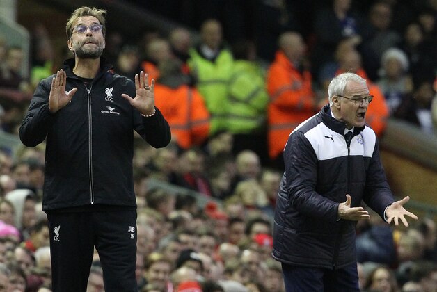 Liverpool's German manager Jurgen Klopp (L) and Leicester City's Italian manager Claudio Ranieri (R) gesture from the touchline during the English Premier League football match between Liverpool and Leicester City at the Anfield stadium in Liverpool, north-west England on December 26, 2015. Liverpool won the game 1-0.  AFP PHOTO / LINDSEY PARNABYRESTRICTED TO EDITORIAL USE. No use with unauthorized audio, video, data, fixture lists, club/league logos or 'live' services. Online in-match use limited to 75 images, no video emulation. No use in betting, games or single club/league/player publications. / AFP / LINDSEY PARNABY        (Photo credit should read LINDSEY PARNABY/AFP/Getty Images)