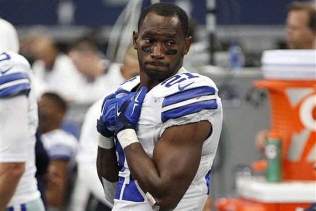 FILE - In this Sept. 27, 2015, file photo, Dallas Cowboys' Joseph Randle stands in the team bench area during an NFL football game against the Atlanta Falcons, in Arlington, Texas. Former Dallas Cowboys running back Joseph Randle was jailed early Wednesday, Nov. 25, 2015,  after an altercation at a Kansas casino. Randle was asked to leave the Kansas Star Casino in Mulvane late Tuesday after causing some unspecified concerns on the casino floor, said Fred Waller, an enforcement agent with the Kansas Racing and Gaming Commission. Randle left, but then returned. Randle started arguing with security officers, and a scuffle ensued, Waller said. Several agents had to restrain him and he was taken to the county jail. (AP Photo/Brandon Wade, File)