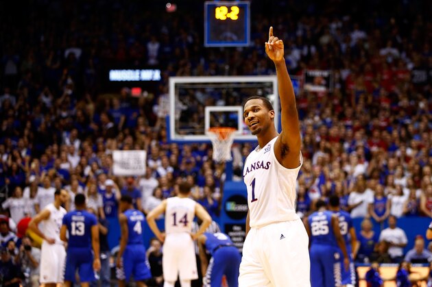 LAWRENCE, KS - JANUARY 30:  Wayne Selden Jr. #1 of the Kansas Jayhawks celebrates during the final seconds of overtime in the game against the Kentucky Wildcats as Kansas defeated Kentucky with a final score of 90-84 at Allen Fieldhouse on January 30, 2016 in Lawrence, Kansas.  (Photo by Jamie Squire/Getty Images)