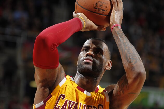 CLEVELAND, OH - JANUARY 30:  LeBron James #23 of the Cleveland Cavaliers prepares to shoot a free throw against the San Antonio Spurs on January 30, 2016 at Quicken Loans Arena in Cleveland, Ohio. NOTE TO USER: User expressly acknowledges and agrees that, by downloading and/or using this Photograph, user is consenting to the terms and conditions of the Getty Images License Agreement. Mandatory Copyright Notice: Copyright 2016 NBAE  (Photo by Gregory Shamus/NBAE via Getty Images)