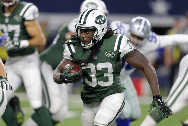 New York Jets running back Chris Ivory (33) runs the ball against the Dallas Cowboys in the first half of an NFL football game, Saturday, Dec. 19, 2015, in Arlington, Texas. (AP Photo/Brandon Wade)