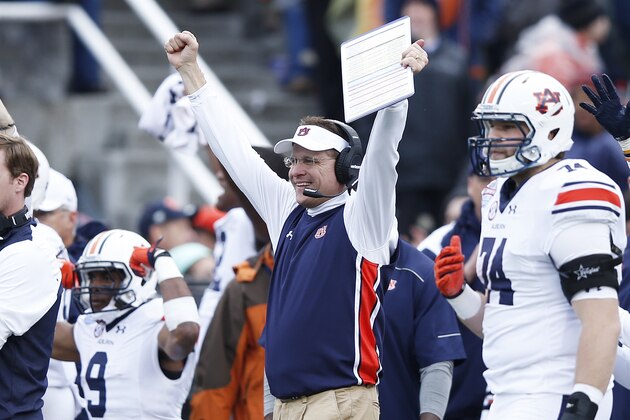 BIRMINGHAM, AL - DECEMBER 30: Head coach Gus Malzahn of the Auburn Tigers celebrates a touchdown against the Memphis Tigers in the second half of the Birmingham Bowl at Legion Field on December 30, 2015 in Birmingham, Alabama. Auburn defeated Memphis 31-10. (Photo by Joe Robbins/Getty Images) BIRMINGHAM, AL - DECEMBER 30: Head coach Gus Malzahn of the Auburn Tigers celebrates a touchdown against the Memphis Tigers in the second half of the Birmingham Bowl at Legion Field on December 30, 2015 in Birmingham, Alabama. Auburn defeated Memphis 31-10. (Photo by Joe Robbins/Getty Images)