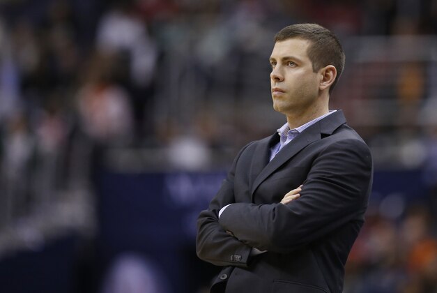Boston Celtics head coach Brad Stevens reacts in the second half of an NBA basketball game against the Washington Wizards, Saturday, Jan. 16, 2016, in Washington. The Celtics won 119-117. (AP Photo/Alex Brandon)