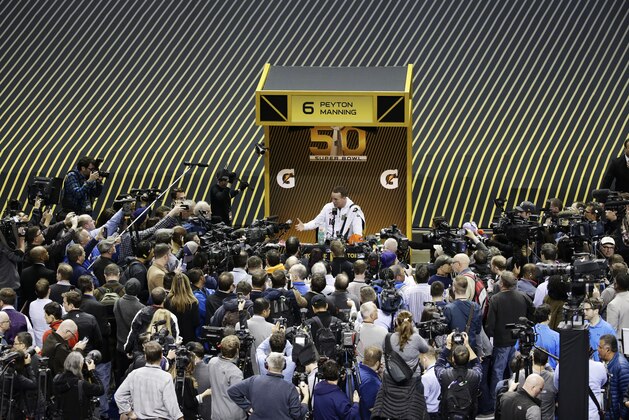 Denver Broncos quarterback Peyton Manning answers questions during Opening Night for the NFL Super Bowl 50 football game Monday, Feb. 1, 2016, in San Jose, Calif. (AP Photo/Charlie Riedel)