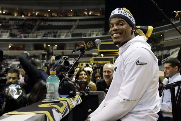 Carolina Panthers' Cam Newton smiles during Opening Night for the NFL Super Bowl 50 football game Monday, Feb. 1, 2016, in San Jose, Calif. (AP Photo/David J. Phillip)