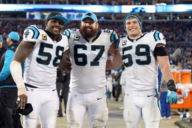 CHARLOTTE, NC - JANUARY 24:  Thomas Davis #58, Ryan Kalil #67 and Luke Kuechly #59 of the Carolina Panthers pose on the sidelines during the NFC Championship Game against the Arizona Cardinals at Bank of America Stadium on January 24, 2016 in Charlotte, North Carolina.  (Photo by Streeter Lecka/Getty Images)