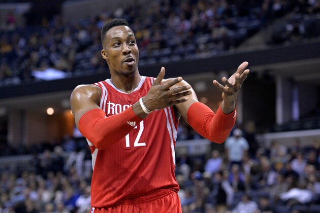 Houston Rockets center Dwight Howard (12) gestures to fans in the second half of an NBA basketball game Tuesday, Jan. 12, 2016, in Memphis, Tenn. (AP Photo/Brandon Dill)
