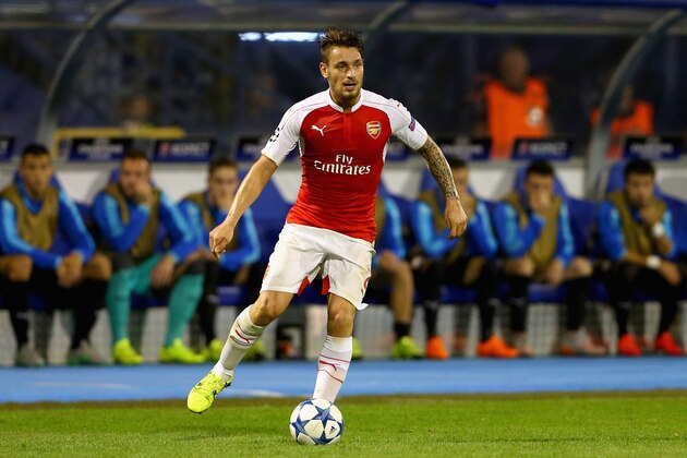 ZAGREB, CROATIA - SEPTEMBER 16:  Mathieu Debuchy of Londons runs with the ball during the UEFA Champions League Group F match between Dinamo Zagreb and Arsenal at Maksimir Stadium on September 16, 2015 in Zagreb, Croatia.  (Photo by Alexander Hassenstein/Getty Images)