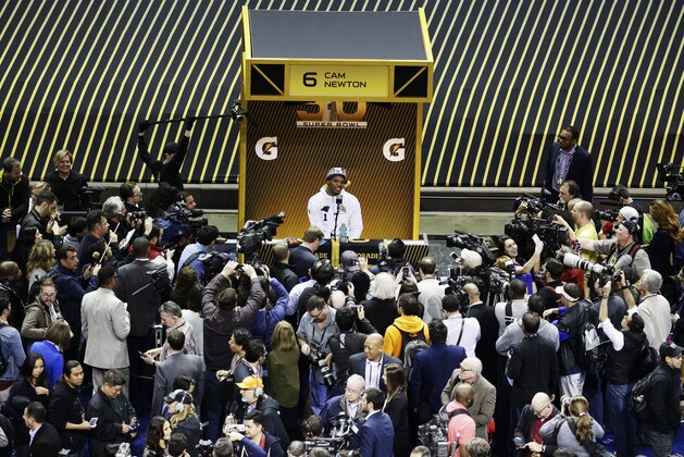 Carolina Panthers quarterback Cam Newton speaks to members of the media during Opening Night for the NFL Super Bowl 50 football game Monday, Feb. 1, 2016, in San Jose, Calif. (AP Photo/Charlie Riedel)