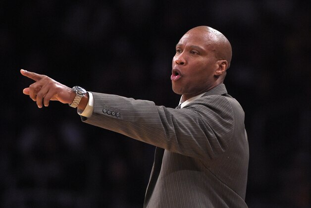Los Angeles Lakers head coach Byron Scott gestures during the first half of an NBA basketball game against the Phoenix Suns, Sunday, Jan. 3, 2016, in Los Angeles. (AP Photo/Mark J. Terrill)
