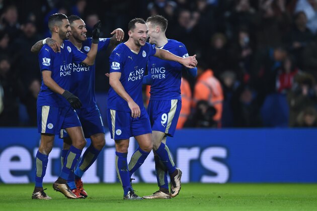 LEICESTER, ENGLAND - JANUARY 23:  Danny Drinkwater of Leicester City celebrates with team mates Riyad Mahrez, Jamie Vardy and Danny Simpson after the 3rd Leicester goal during the Barclays Premier League match between Leicester City and Stoke City at  (Photo by Michael Regan/Getty Images)
