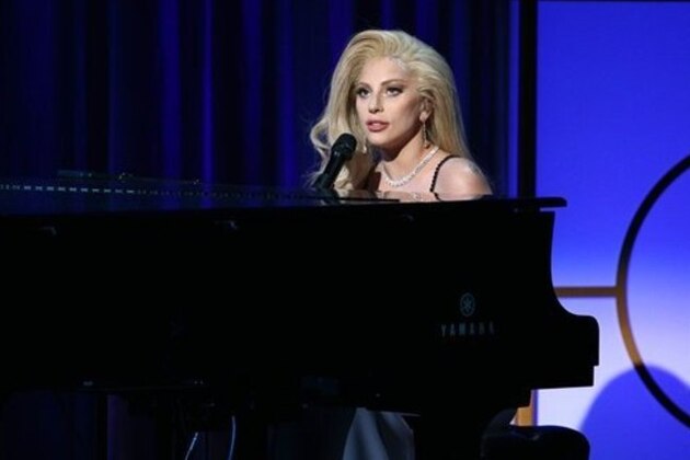 IMAGE DISTRIBUTED FOR PRODUCERS GUILD OF AMERICA - Lady Gaga performs at the 27th annual Producers Guild Awards at the Hyatt Regency Century Plaza on Saturday, Jan. 23, 2016, in Los Angeles. (Photo by John Salangsang/Invision for Producers Guild of America/AP Images)