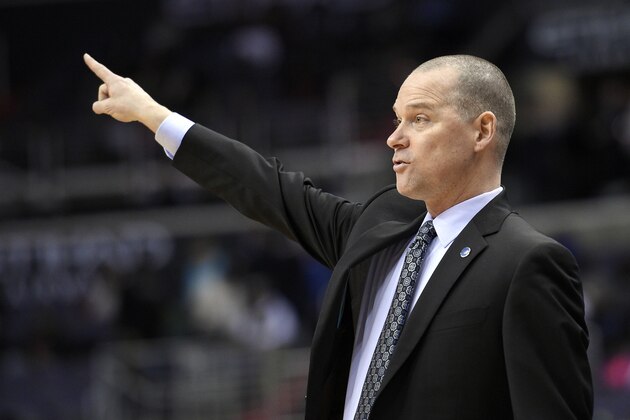 Denver Nuggets coach Michael Malone gestures during the second half of the team's NBA basketball game against the Washington Wizards on Thursday, Jan. 28, 2016, in Washington. The Nuggets won 117-113. (AP Photo/Nick Wass)