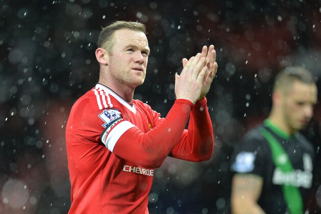 Manchester United's English striker Wayne Rooney applauds at the end of the English Premier League football match between Manchester United and Stoke City at Old Trafford in Manchester, north west England, on February 2, 2016. / AFP / PAUL ELLIS / RESTRICTED TO EDITORIAL USE. No use with unauthorized audio, video, data, fixture lists, club/league logos or 'live' services. Online in-match use limited to 75 images, no video emulation. No use in betting, games or single club/league/player publications.  /         (Photo credit should read PAUL ELLIS/AFP/Getty Images)