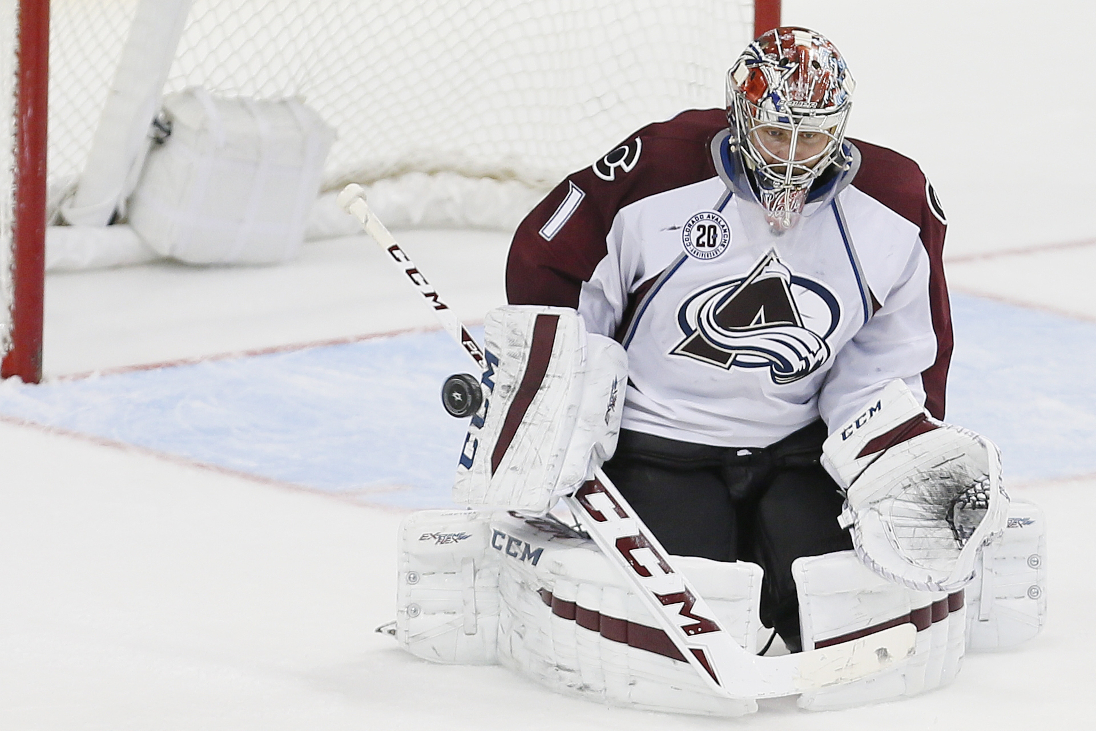 Colorado Avalanche goalie Semyon Varlamov (1) deflects a shot on goal during the third period of an NHL hockey game against the Dallas Stars Saturday, January 23, 2016, in Dallas. Colorado won 3-1. (AP Photo/Brandon Wade) Colorado Avalanche goalie Semyon Varlamov (1) deflects a shot on goal during the third period of an NHL hockey game against the Dallas Stars Saturday, January 23, 2016, in Dallas. Colorado won 3-1. (AP Photo/Brandon Wade)
