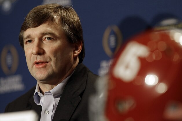 Alabama defensive coordinator and Georgia head coach Kirby Smart speaks during a news conference for the NCAA Cotton Bowl college football game Monday, Dec. 28, 2015, in Dallas. Smart, a former Georgia football player, was hired to be the Bulldogs head coach the day after Alabama won the Southeastern Conference championship. While laying the groundwork for his own program, recruiting and hiring coaches, he has also been preparing the Crimson Tide to face Michigan State in the College Football Playoff semifinal at the Cotton Bowl on Thursday. (AP Photo/LM Otero)