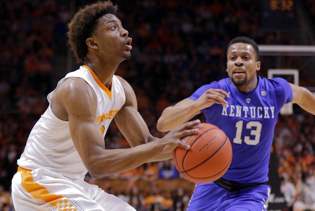 Feb 2, 2016; Knoxville, TN, USA; Tennessee Volunteers guard Robert Hubbs III (3) moves the ball against Kentucky Wildcats guard Isaiah Briscoe (13) during the first half at Thompson-Boling Arena. Mandatory Credit: Randy Sartin-USA TODAY Sports