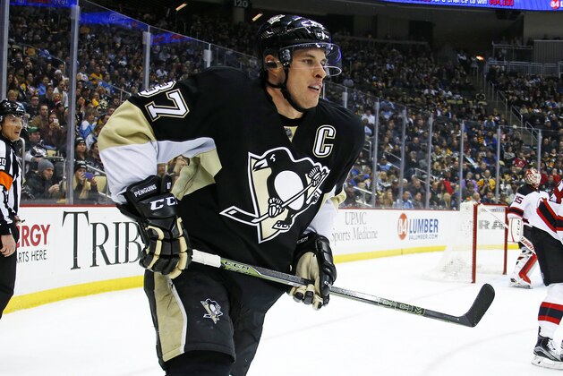 Pittsburgh Penguins' Sidney Crosby (87) plays in an NHL hockey game against the New Jersey Devils in Pittsburgh, Tuesday, Jan. 26, 2016. (AP Photo/Gene J. Puskar)