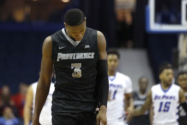 Providence guard Kris Dunn (3) walks to the other end of the court after missing a 3-point shot in the closing seconds of the team's NCAA college basketball game against DePaul on Tuesday, Feb. 2, 2016, in Rosemont, Ill. DePaul won 77-70. (AP Photo/Charles Rex Arbogast)