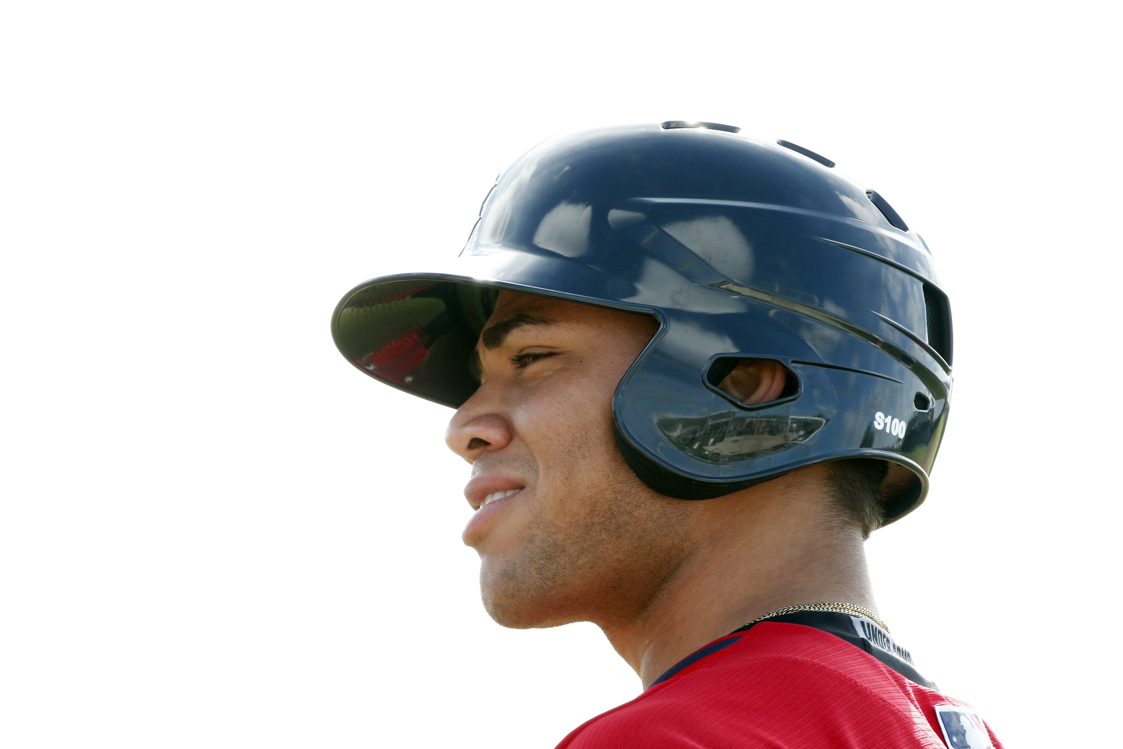 Boston Red Sox' Yoan Moncada waits to bat during practices at spring training, Friday, March 13, 2015, in Fort Myers Fla. The Red Sox have finalized a minor league contract with the 19-year-old Cuban infielder that includes a $31.5 million signing bonus, easily a record for an international amateur free agent under 23 years old. (AP Photo/Brynn Anderson)