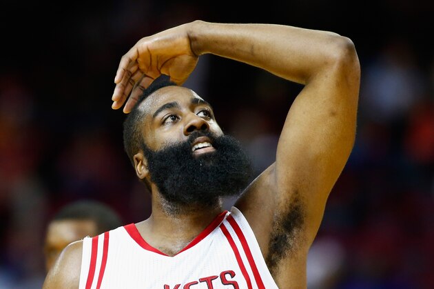 HOUSTON, TX - FEBRUARY 02:  James Harden #13 of the Houston Rockets reacts to a basket against the Miami Heat during their game at the Toyota Center on February 2, 2016  in Houston, Texas. NOTE TO USER: User expressly acknowledges and agrees that, by downloading and or using this Photograph, user is consenting to the terms and conditions of the Getty Images License Agreement.  (Photo by Scott Halleran/Getty Images)