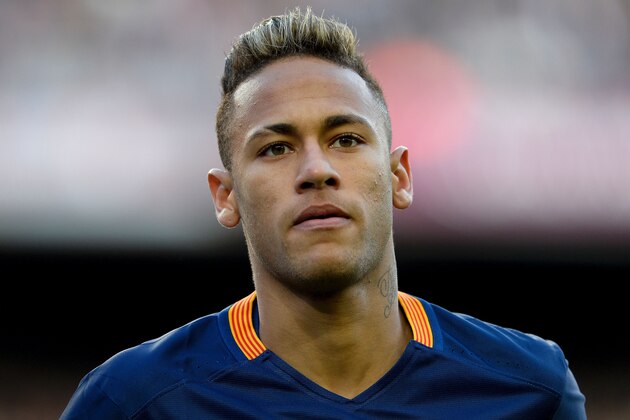 Barcelona's Brazilian forward Neymar looks on during the Spanish league football match FC Barcelona vs Club Atletico de Madrid at the Camp Nou stadium in Barcelona on January 30, 2016. Barcelona won 2-1.   AFP PHOTO/ JOSEP LAGO / AFP / JOSEP LAGO        (Photo credit should read JOSEP LAGO/AFP/Getty Images)